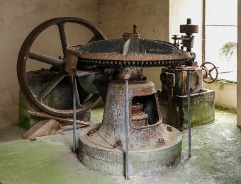 Mécanisme d'entrainement des meules